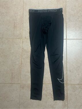Nike Kids Black Compression Leggings with White Swoosh